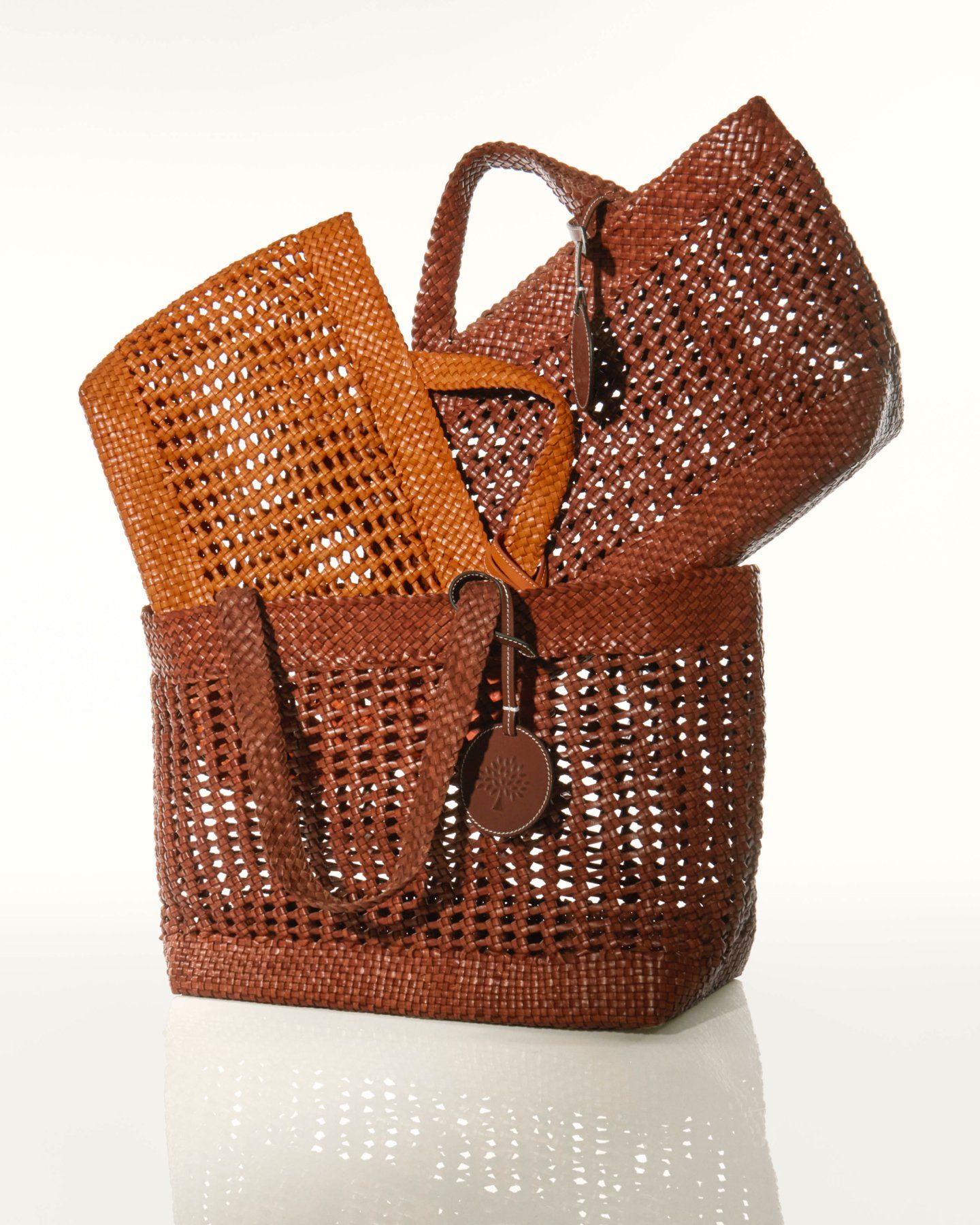trio of mulberry woven tote bags in vintage oak